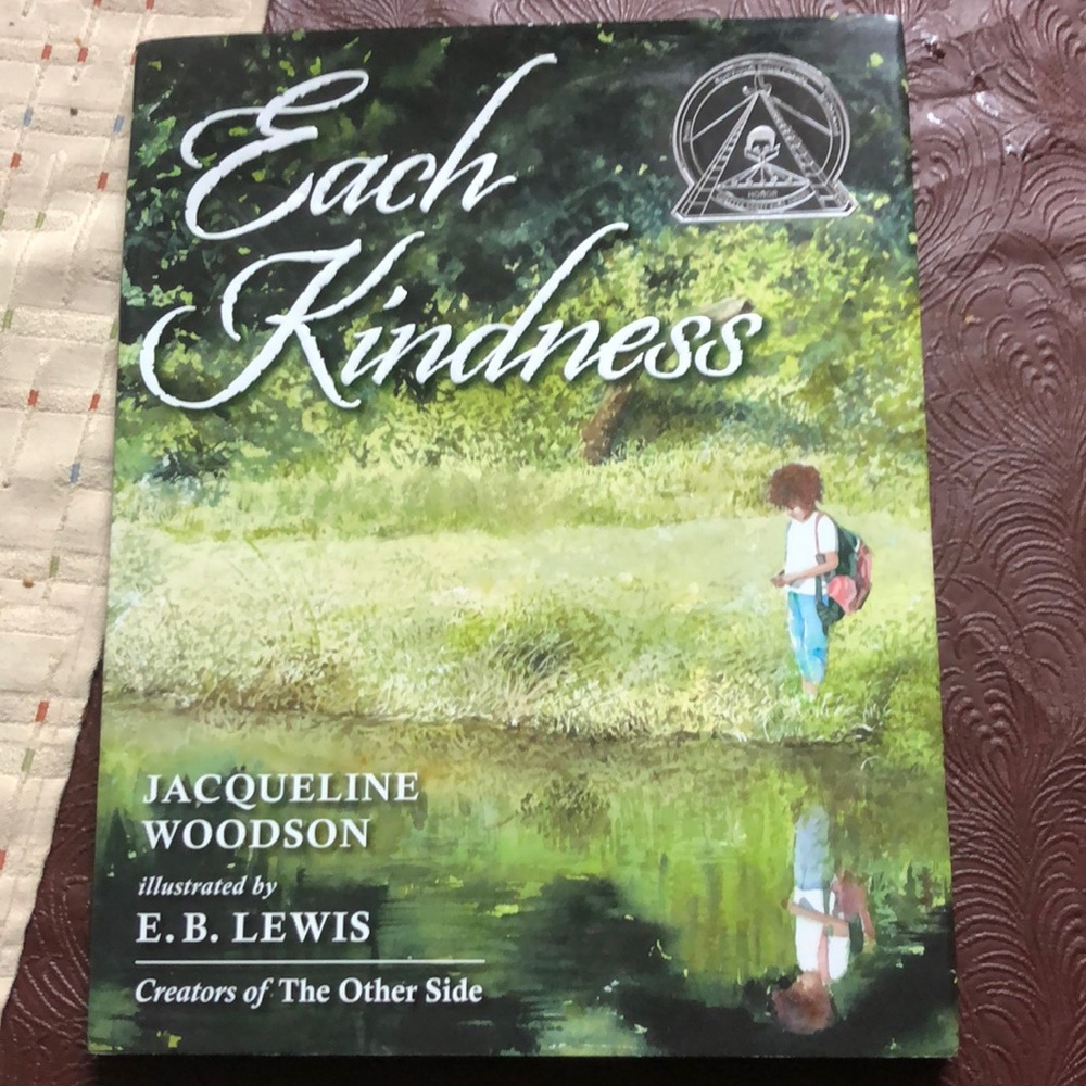 "Each kindness" kids hard cover book by Jacqueline Woodson